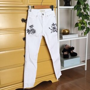 White embroidered denim